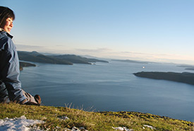 Dr. Lem and the view at Mount Galiano, BC (Photo courtesy of Melissa Lem)