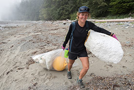 Hauling foam, a buoy and other marine debris during a 2016 Great Canadian Shoreline Cleanup. (Photo courtesy of Rachel Schoeler)