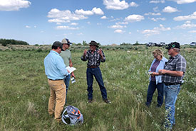 NCC Stewardship Coordinator, Casey Rempel, engaging with Aberdeen Pasture patrons during a field event. (Photo by Matthew Braun/NCC staff)