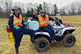 Allery Safruk and Mena Wallace, volunteer conservation interns and CCC participants, conducting invasive species control. (Photo by NCC)