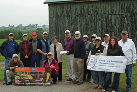 Cold Creek Stewardship receiving a cheque for improvements to the CA building at Benjamin Moore Award presentation. (Photo by Bill Wilson)