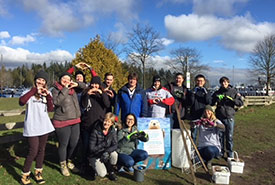 Great Canadian Shoreline Cleanup participants show their love for Canada's shorelines after a day of hard work (Photo courtesy of GCSC)