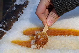 Maple syrup taffy (Photo by Wikimedia Commons, Jaime Walker, CC BY 2.0)