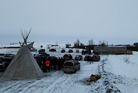 Members of The Key First Nation awaiting release of plains bison to their lands (Photo by Parks Canada)
