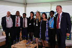 Kaya Dorey (third from right) with five other Young Champions and members of the UN Environment Assembly. (Photo by Niko Palosuo, Covestro)