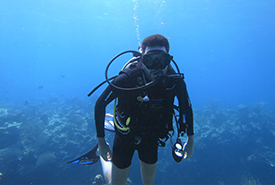 Me diving in Grand Cayman (Photo by Rick Lambert) 