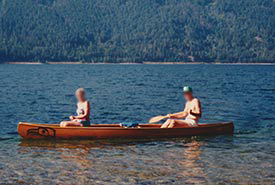 My grandfather's canoe, his pride and joy. Our neighbours out for a paddle in the canoe (Photo courtesy of Asha Swann/NCC intern)