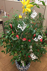Tree decorated with garland and ornaments made from recycled paper (Photo by NCC)