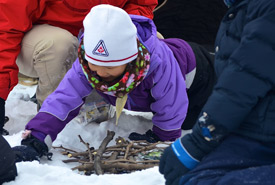 Build a fire to keep warm during your camping adventure. (Photo by Scouts Canada)
