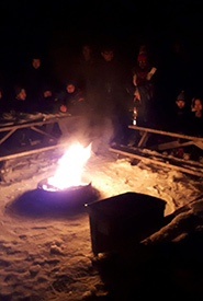 Enjoying a campfire (Photo by Scouts Canada)