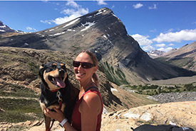 Carys and her dog, Kahlua, at Nigel Pass, AB (Photo by Jesse Knowlden) 