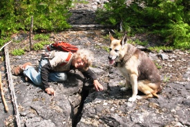 Ellen and Heidi explore a crevice in the alvar landscape (Photo courtesy of Ellen Weatherbee)
