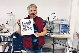 Ida, one of the very talented women who sews apparel for my company, at Syte Industries (Photo by Kaya Dorey)
