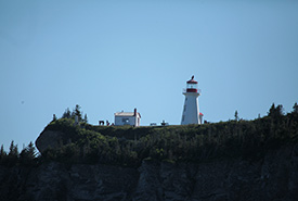 Île aux Perroquets and the historic lighthouse. (Photo courtesy of Quincin Chan)