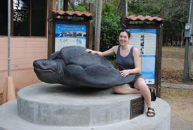 Jen McCarter and leatherback sea turtle statue (Photo by Gabhan Chalmers)