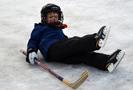 Kathryn Folkl's son, John, playing hockey (Photo by NCC) 