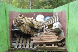 The day's result: three-quarters of a dumpster filled and 24 cubic metres pile of trash collected (Photo by NCC)
