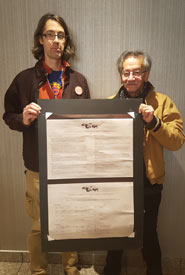 Matthew Braun and Anthony Johnson holding the signed treaty (Photo by NCC)