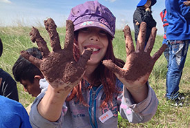 Muddy hands at Nature Days (photo by NCC)