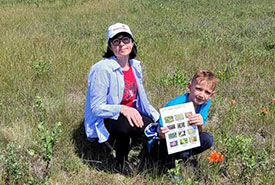 A young participant showing the nature scavenger hunt (Photo by NCC)