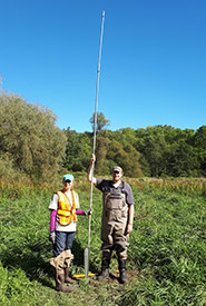 The very long soil core sampler (Photo by Amanda Loder)