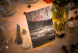 Instead of traditional table numbers, we used photos from our travels in nature to decorate the tables. Just another way to bring nature into the city. (Photo by Wynn Photo)