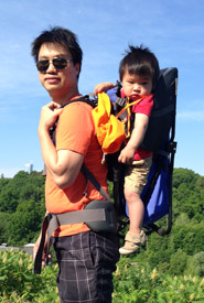 Getting around with your little one using a hiking carrier (Photo by Quincin Chan/NCC)