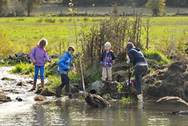 Volunteers helping with wetland restoration (Photo by NCC)