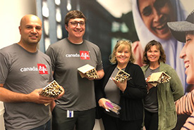 Canada Life employees with their bee hotels (Photo by NCC)