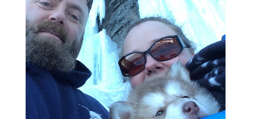 This picture is with my husband and new puppy at Middle Cove Beach. Behind us is the ice wall Mother Nature has made! Gotta love Newfoundland! - Alexandria D.