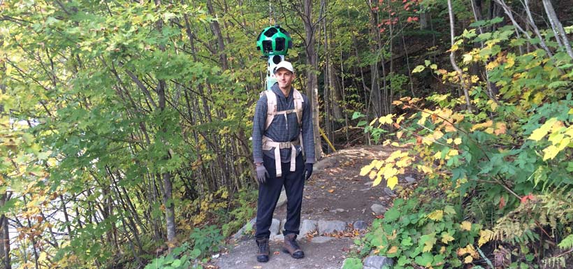 NCC's Julien Poisson sports the Google Trekker on Green Mountains Nature Reserve, QC (Photo by NCC)