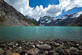 Lake of the Hanging Glacier, Jumbo Valley, BC (Photo by Lucas Jmief)