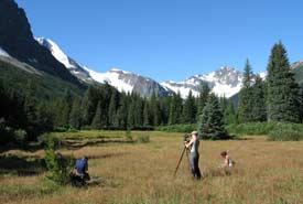 Field staff survey ecological features of Enchantment conservation area (Photo by NCC)