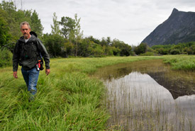 Peter Shaughnessy walks the wetlands at Dalton's Hideaway (Photo by NCC)