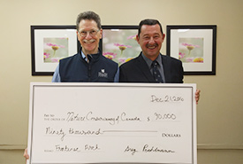 Gary Bell, Eastern Ontario Program Director, and NCC donor Greg Poehlmann (Photo by NCC)