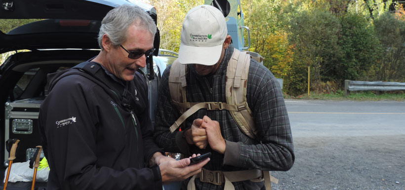 NCC's Luc Thomas and Julien Poisson prepare for the hike (Photo by NCC)